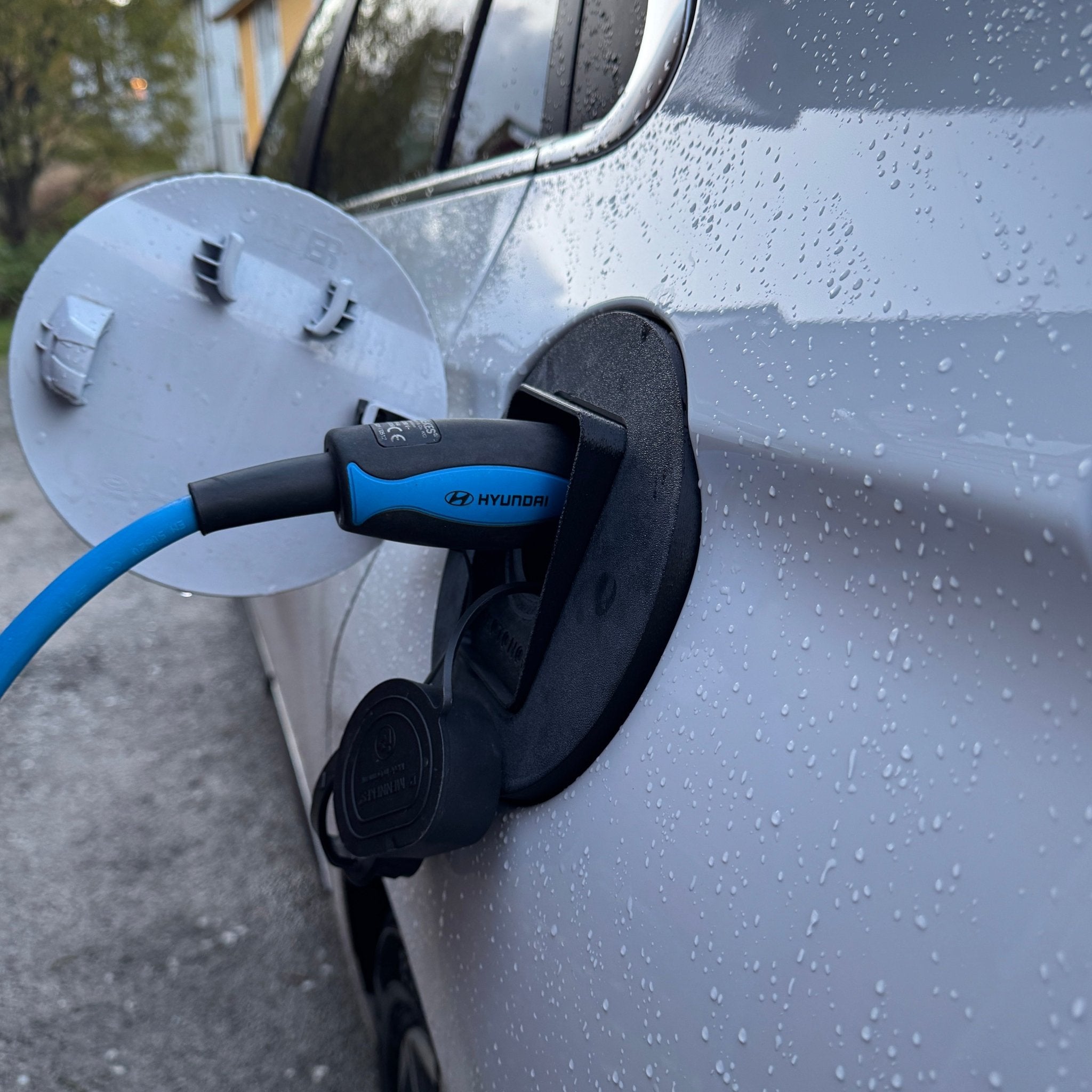 Hyundai IONIQ Electric 2016 - 2022 vær og snø deksel for ladeport - Sort - PROTONORD - PROTONORD